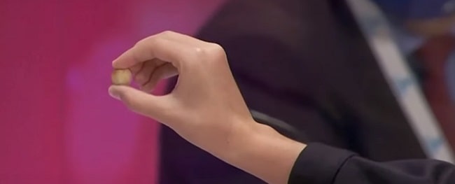 hand holding a lottery ball from the El Gordo lottery